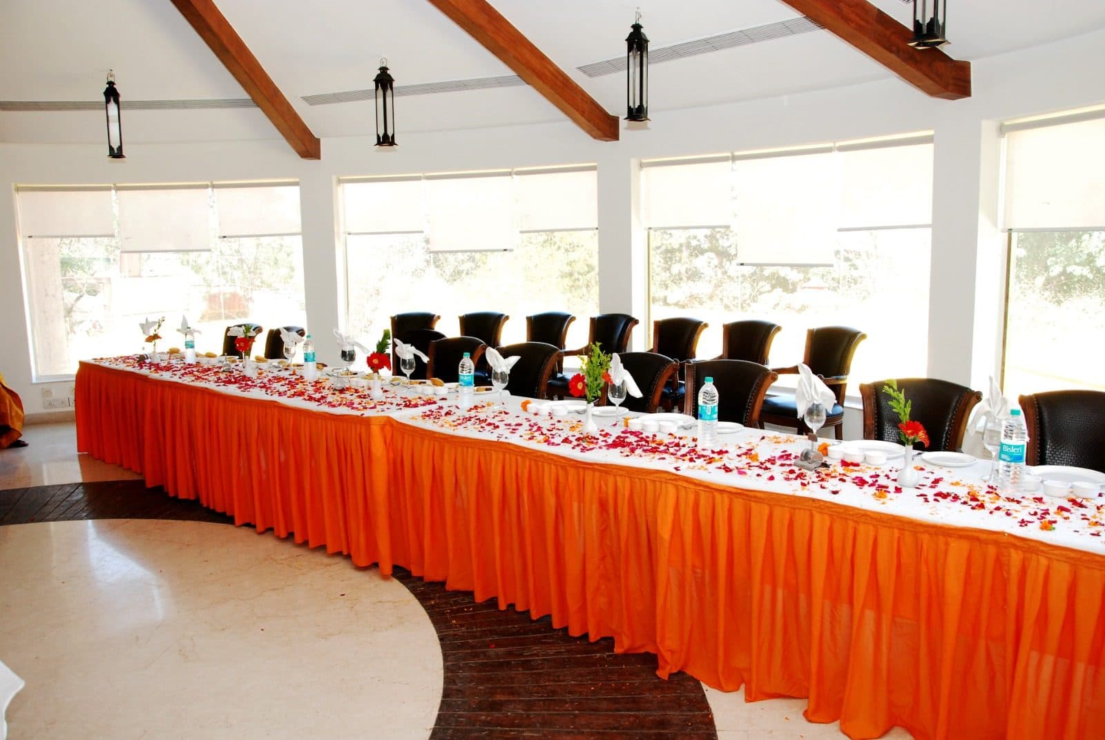 Dining — Banquet Head Table Orange Drape Floral Setup