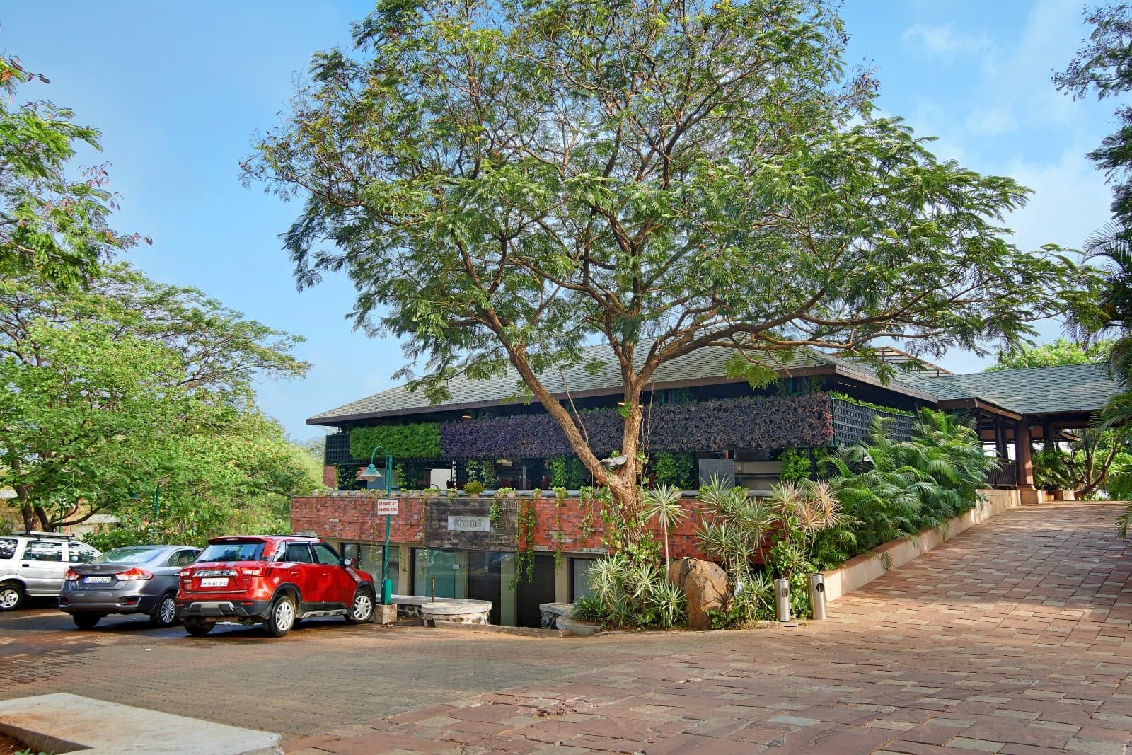 Dining — Rhyme Restaurant Building Driveway View