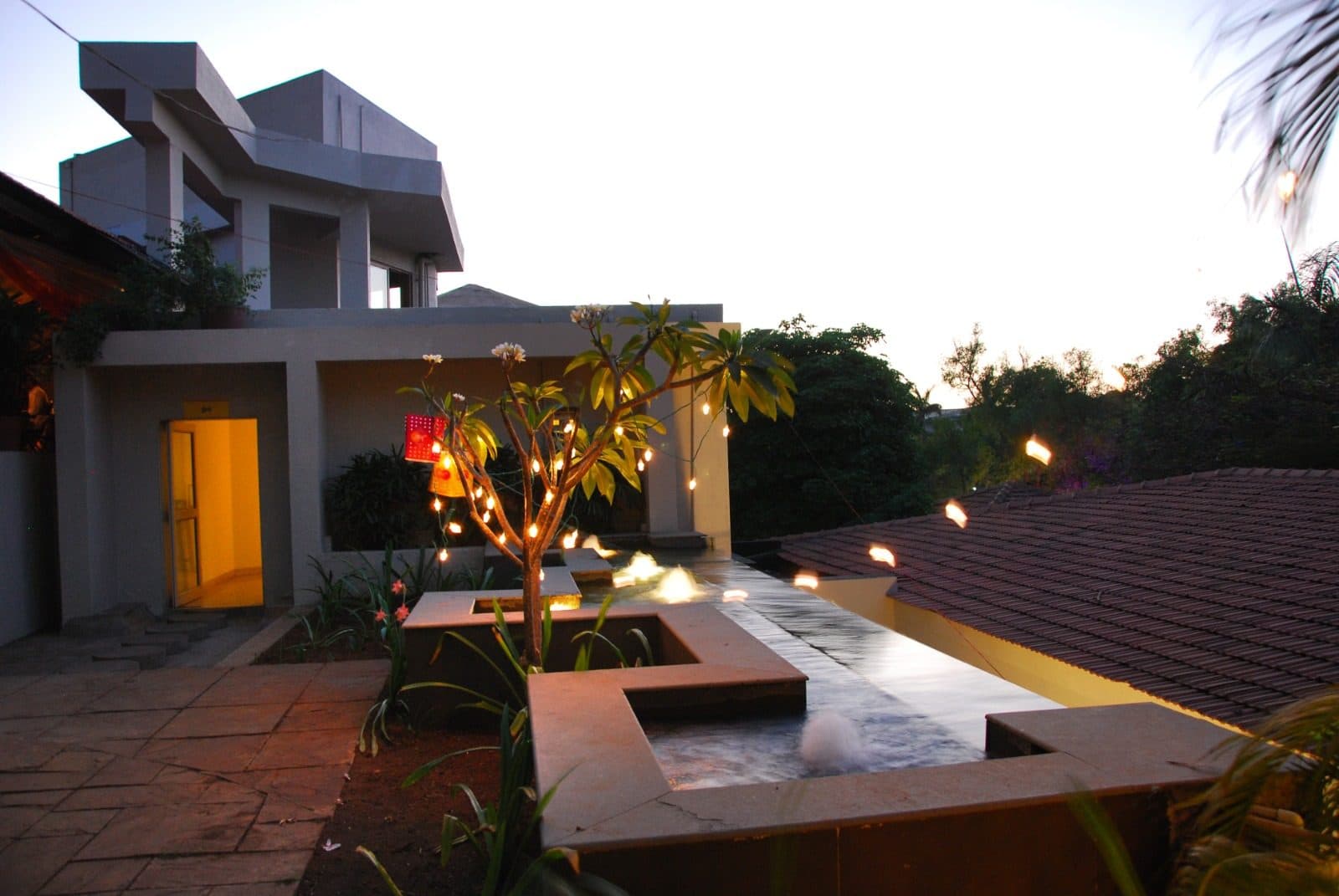 Resort Grounds — Courtyard Water Feature Fairy Lights Dusk