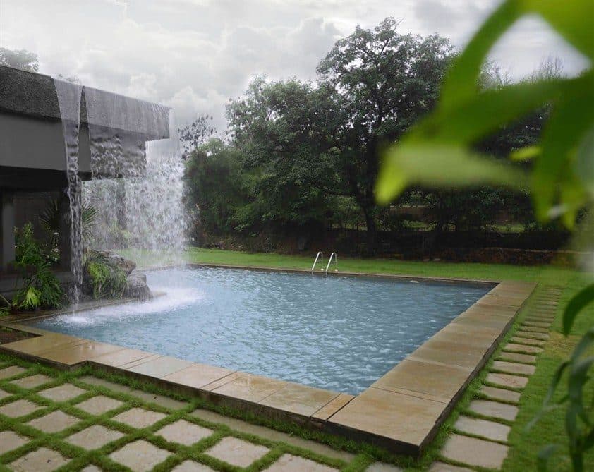 Infinity Pool — Swimming Pool Cascading Waterfall Wall